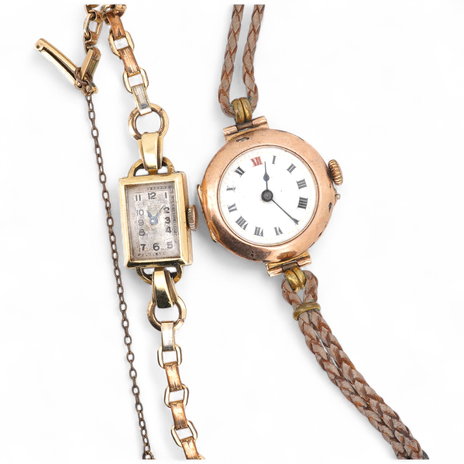 Two lady's 9ct gold manual wind wrist watches, on on fabric strap, the other on gold plated strap.